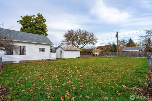 an aerial view of a house with a garden