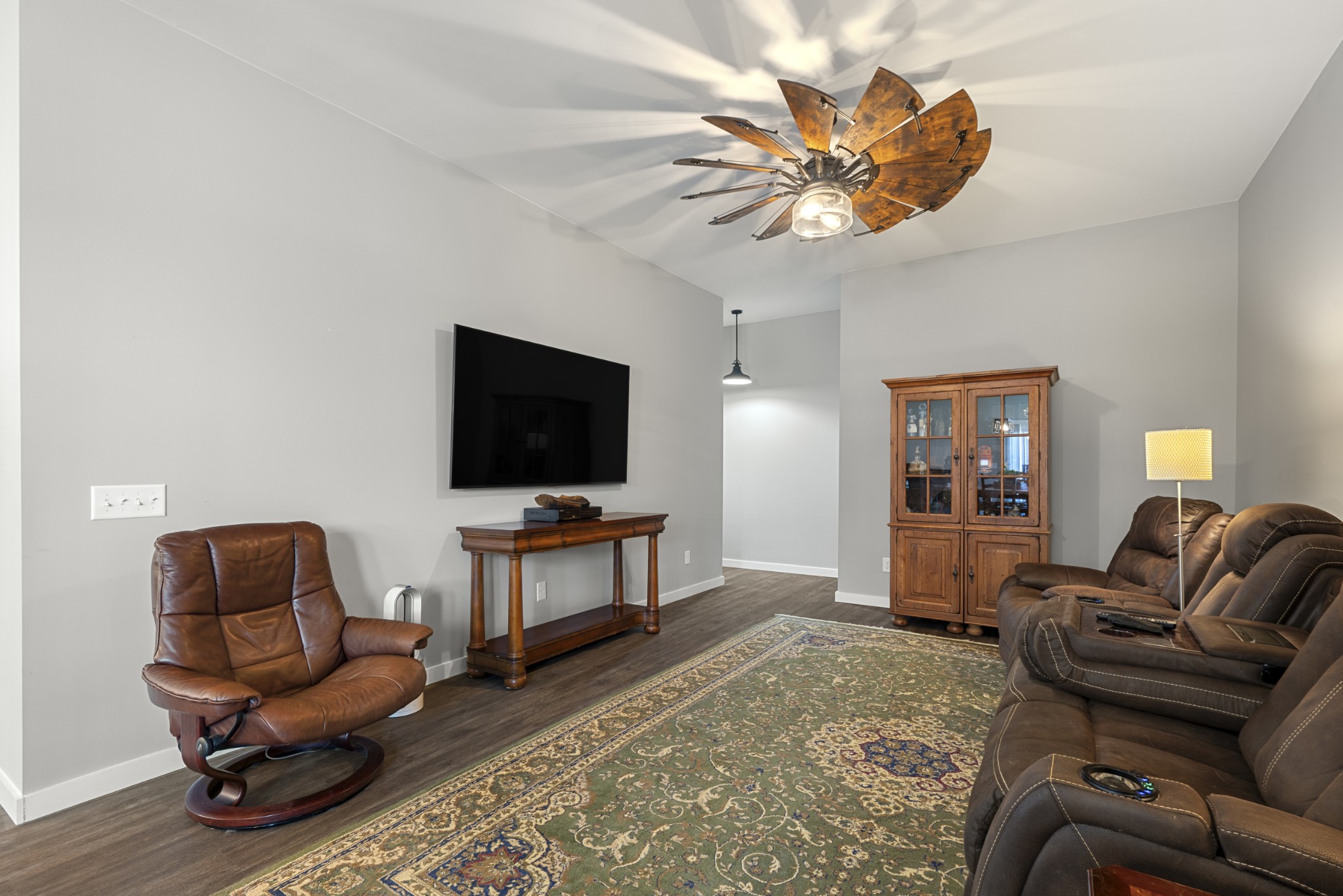 3363 Ridge Road Columbia, TN 38401 - Photo 11 of 43 a living room with furniture a flat screen tv and a dining table