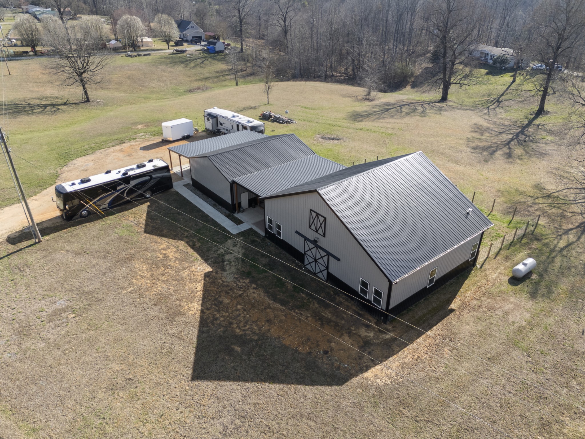 3363 Ridge Road Columbia, TN 38401 - Photo 34 of 43 a view of a swimming pool with lawn chairs and wooden fence