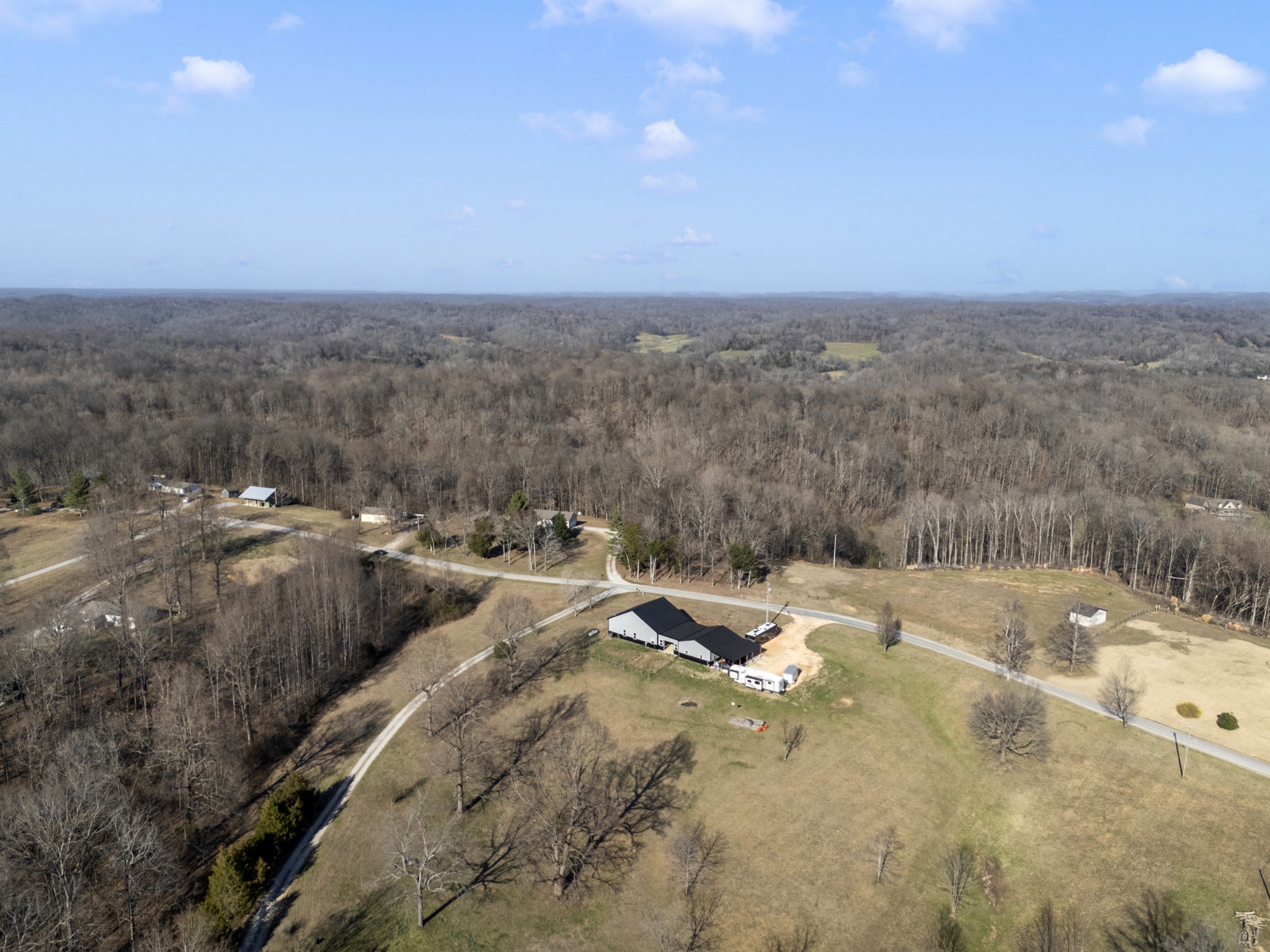 3363 Ridge Road Columbia, TN 38401 - Photo 38 of 43 a view of a dry yard with lots of trees