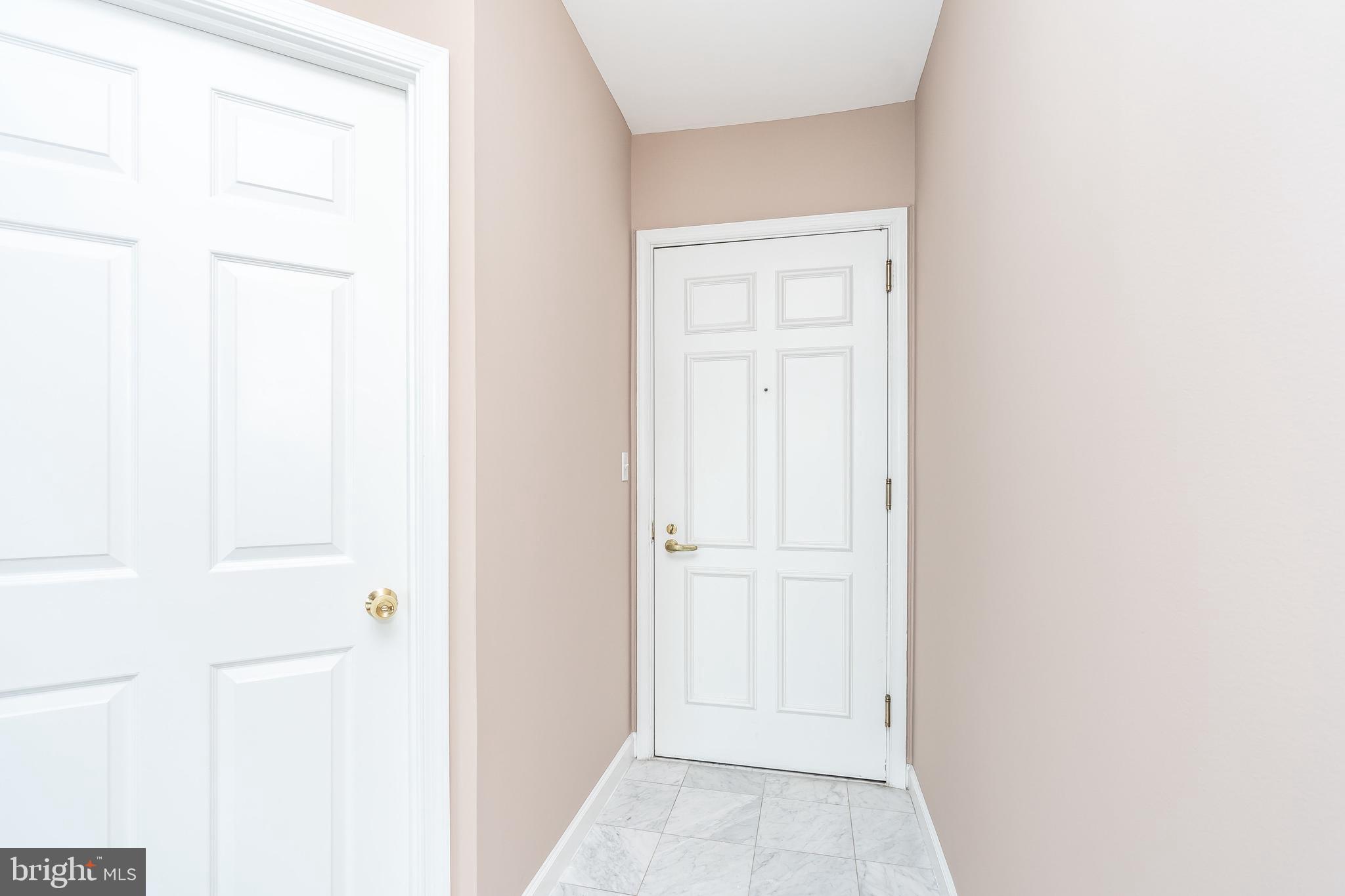 100 Harborview Drive, Unit 1908 Baltimore, MD 21230 - Photo 5 of 60 a view of a hallway