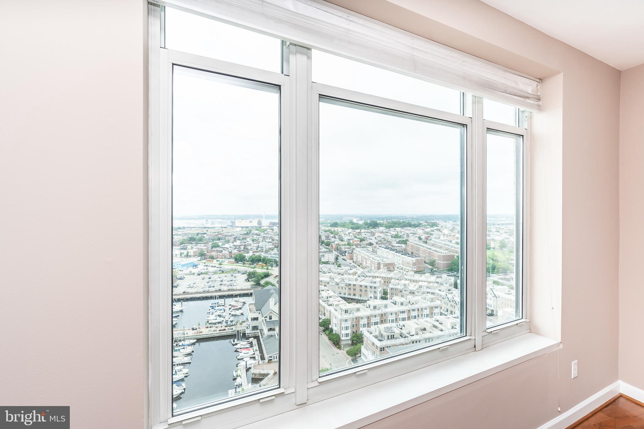 100 Harborview Drive, Unit 1908 Baltimore, MD 21230 - Photo 10 of 60 a view of a room that has a large window