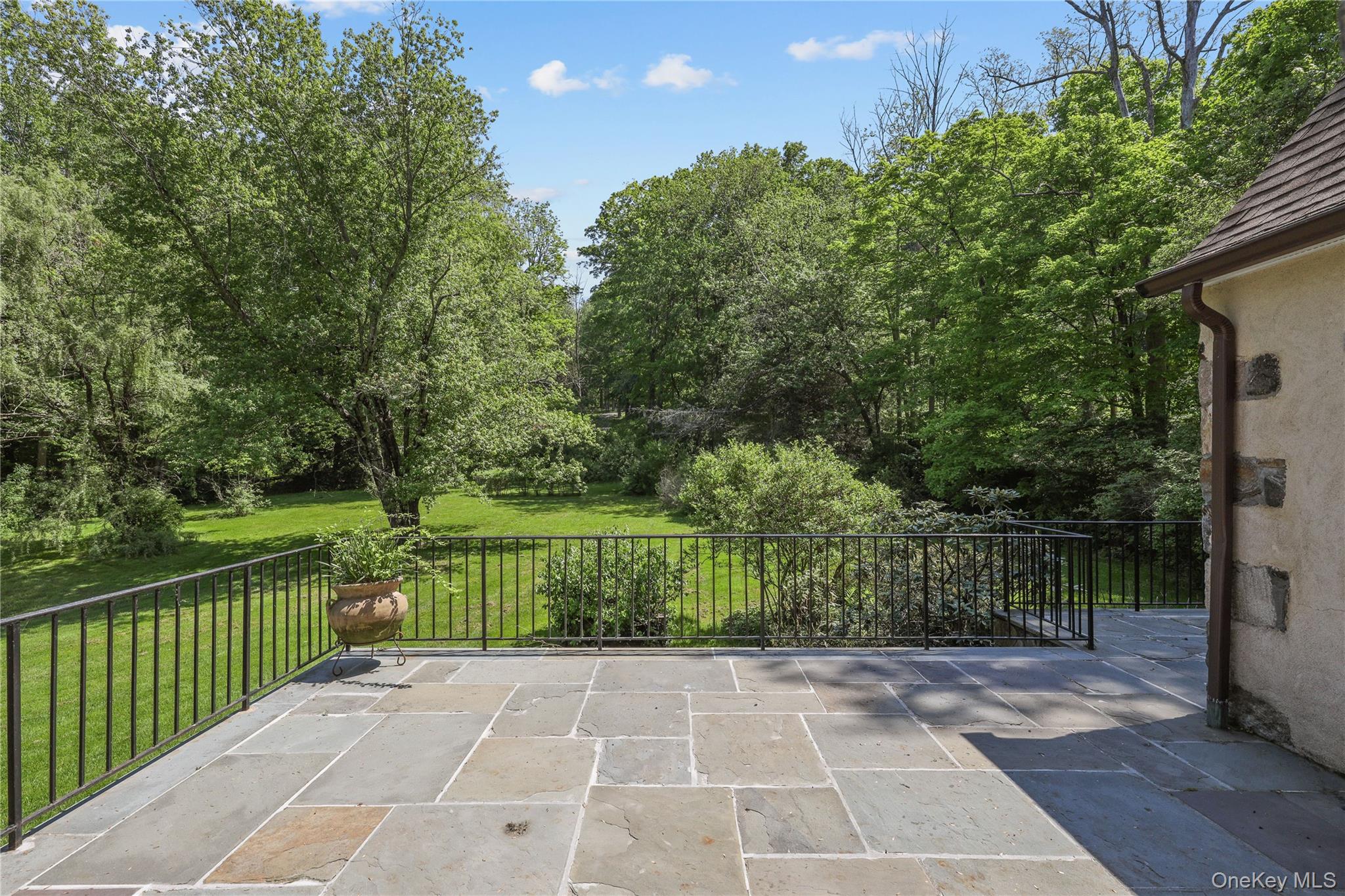 160 Long Ridge Road Bedford, NY 10506 - Photo 22 of 25 a view of a pathway with a wrought fence