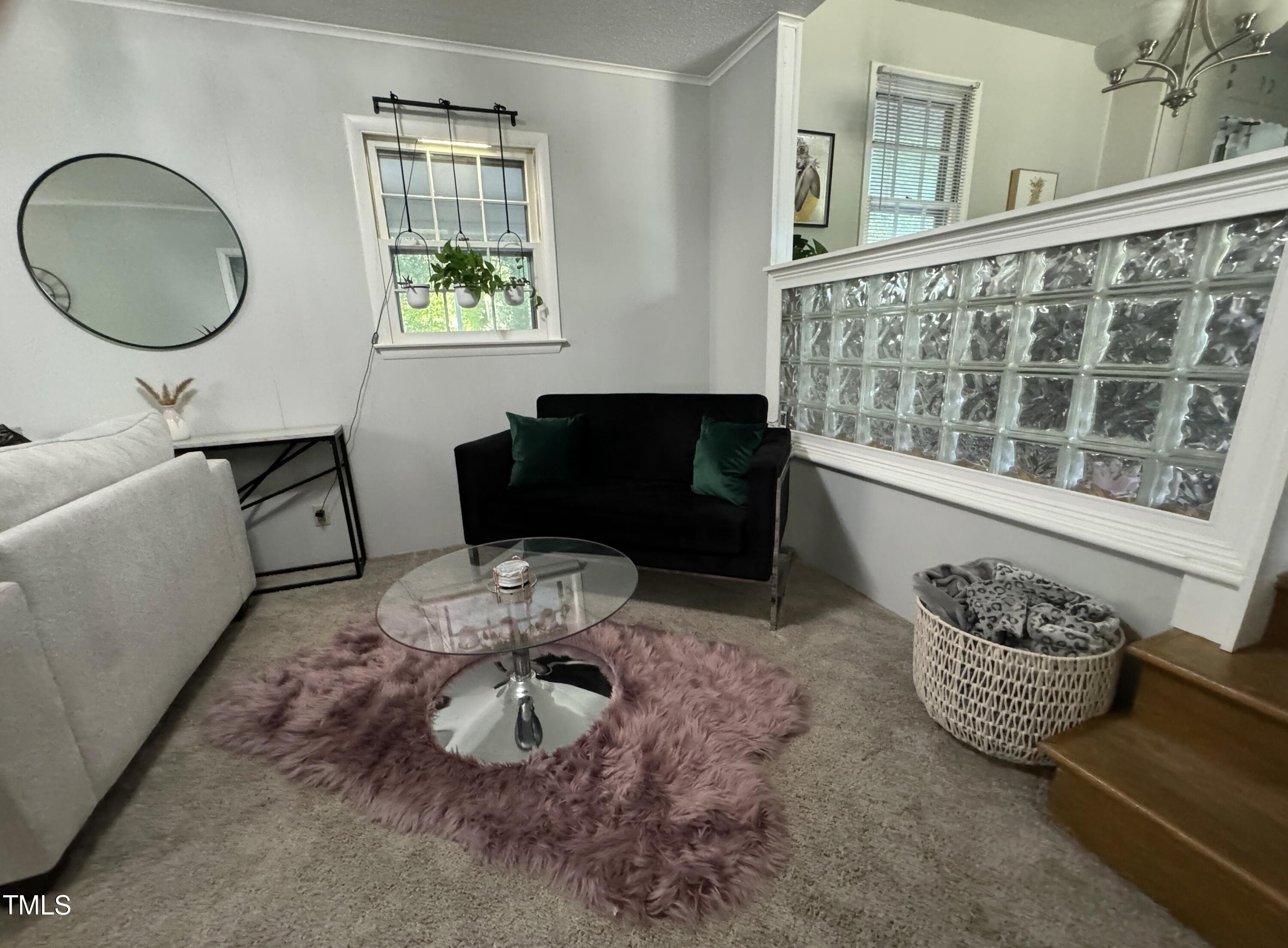 4013 Ingram Drive Raleigh, NC 27604 - Photo 13 of 29 a living room with furniture and a window