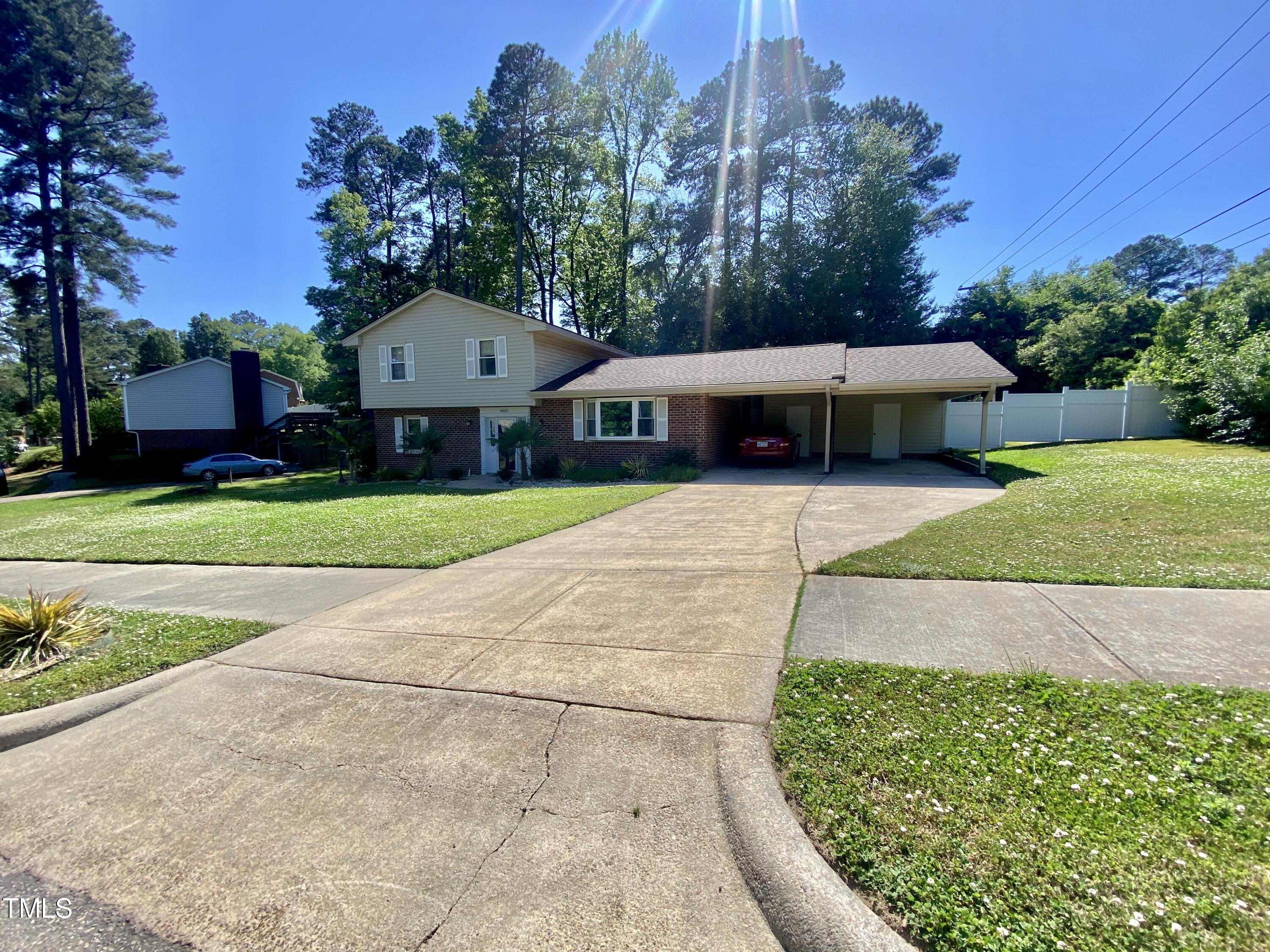 4013 Ingram Drive Raleigh, NC 27604 - Photo 2 of 29 a front view of house with yard and green space