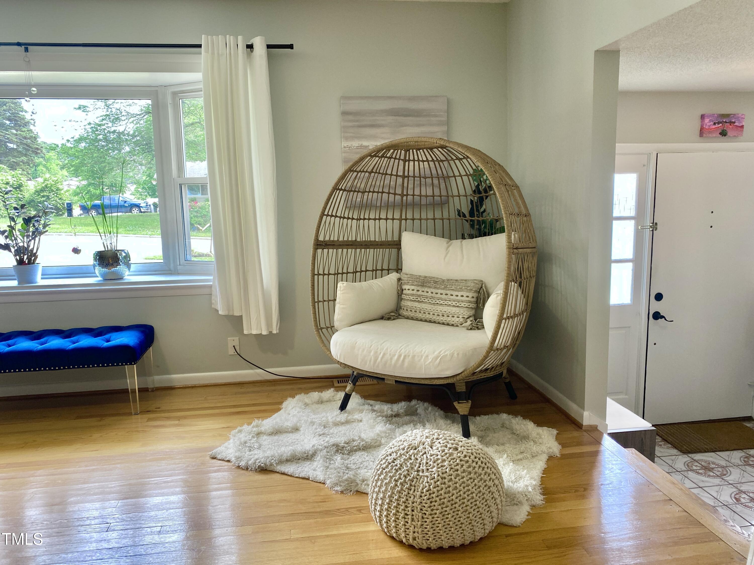 4013 Ingram Drive Raleigh, NC 27604 - Photo 5 of 29 a living room with furniture and a wooden floor
