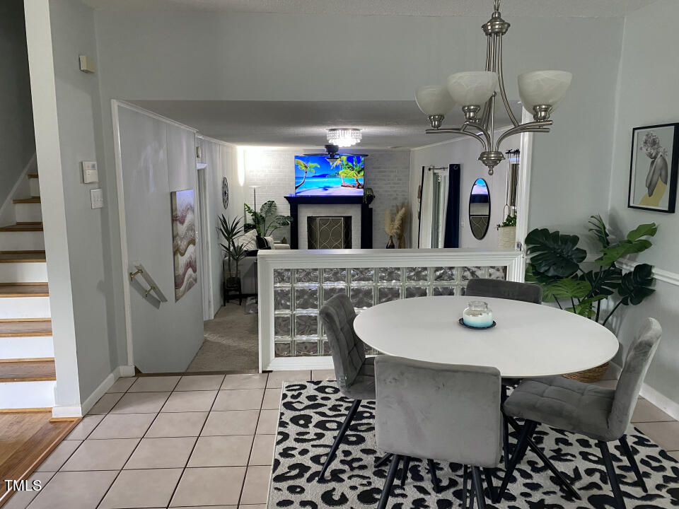 4013 Ingram Drive Raleigh, NC 27604 - Photo 8 of 29 a view of a dining room with furniture