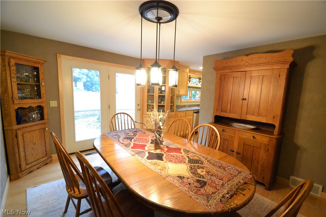 2737 Glenmont Road Northwest Canton, OH 44708 - Photo 9 of 33 Dining room has walk-out to wonderful brick backyard patio