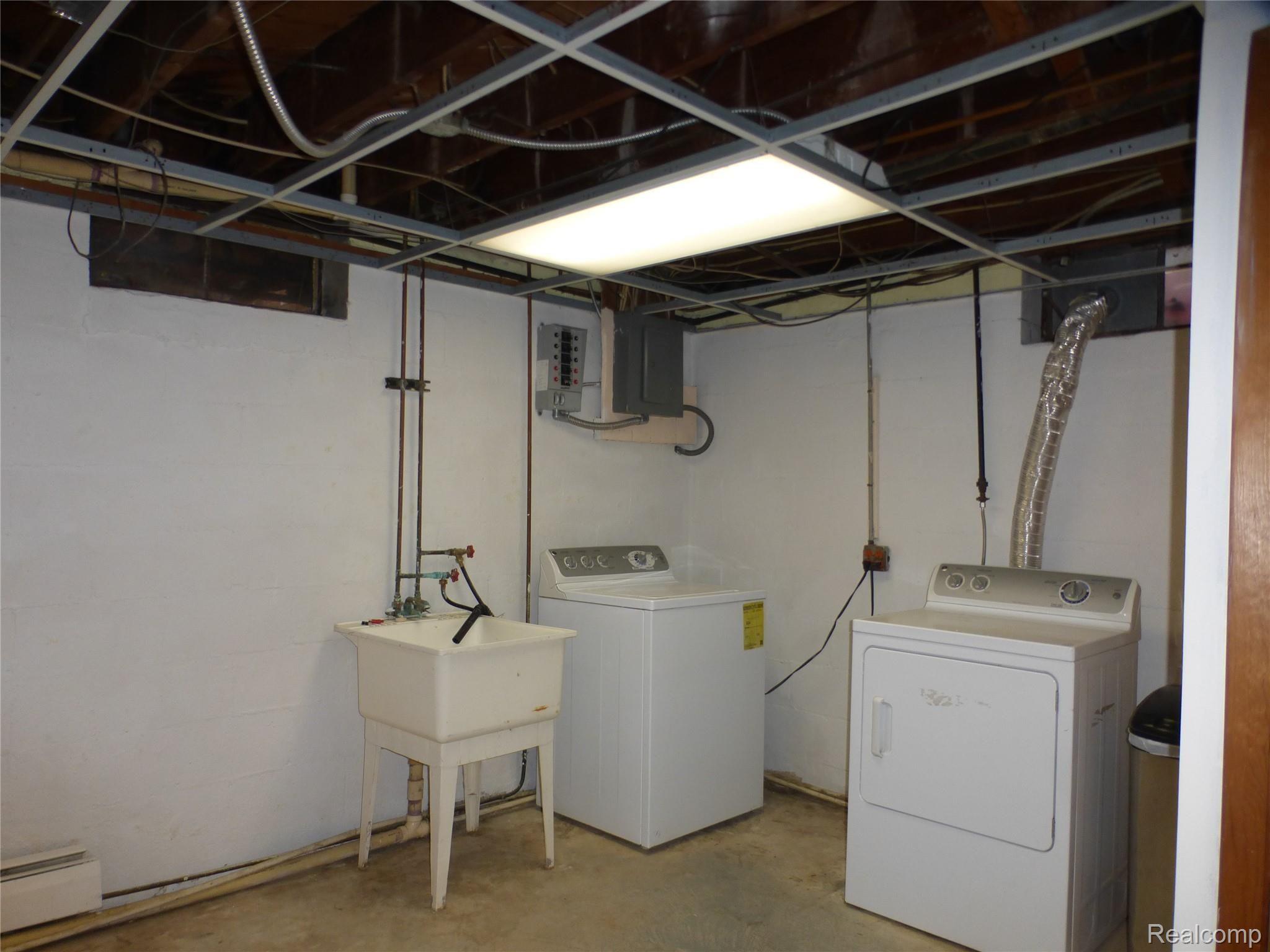 7761 South Eston Road Clarkston, MI 48348 - Photo 25 of 31 Laundry and room to grow!