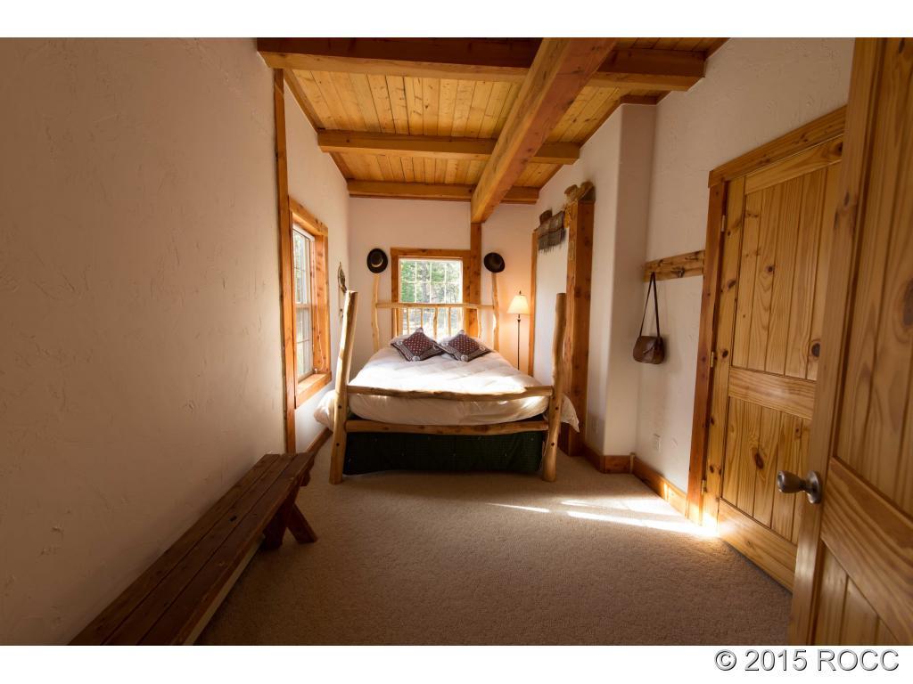 993 Bellows Road Hartsel, CO 80449 - Photo 15 of 24 a room with table and couch