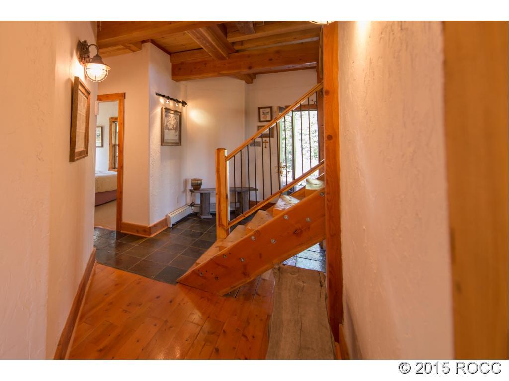 993 Bellows Road Hartsel, CO 80449 - Photo 18 of 24 a view of entryway and hall with wooden floor