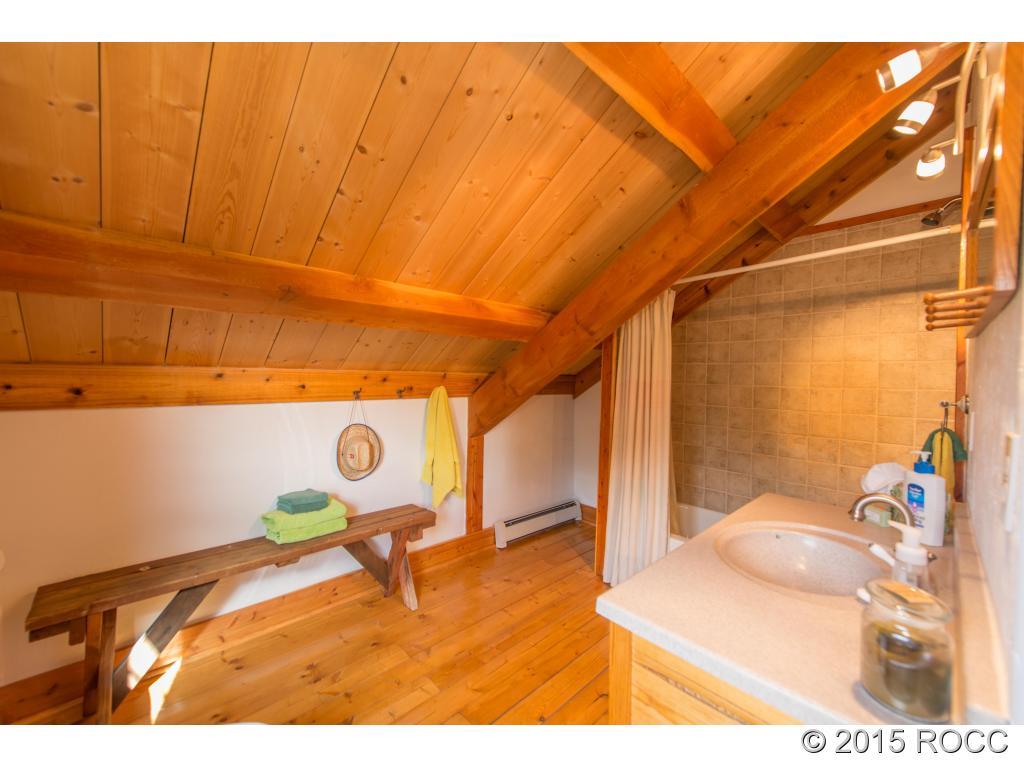 993 Bellows Road Hartsel, CO 80449 - Photo 21 of 24 a bedroom with a bed and a table