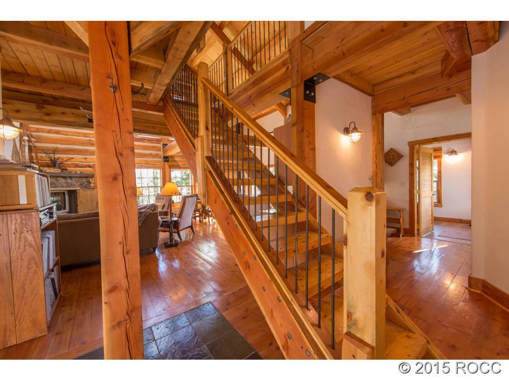 993 Bellows Road Hartsel, CO 80449 - Photo 23 of 24 a view of entryway and hall with wooden floor
