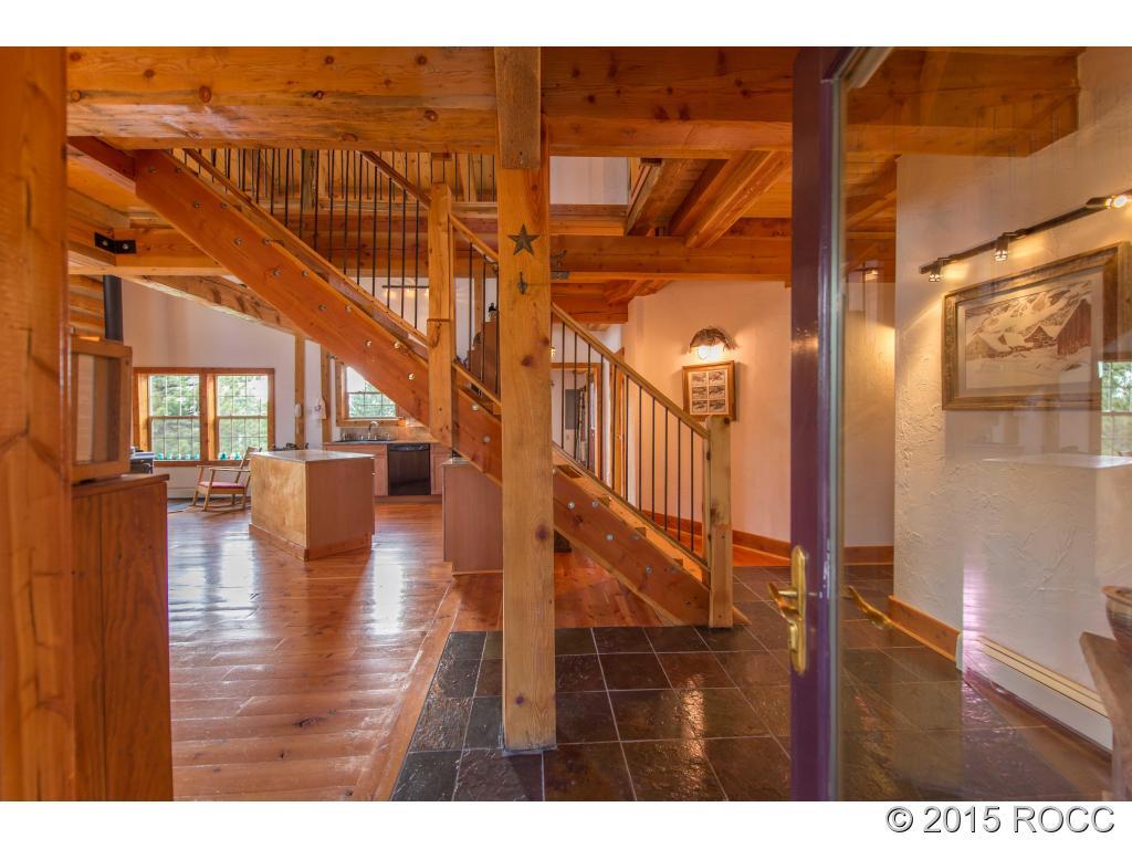 993 Bellows Road Hartsel, CO 80449 - Photo 3 of 24 a view of entryway and hall with wooden floor
