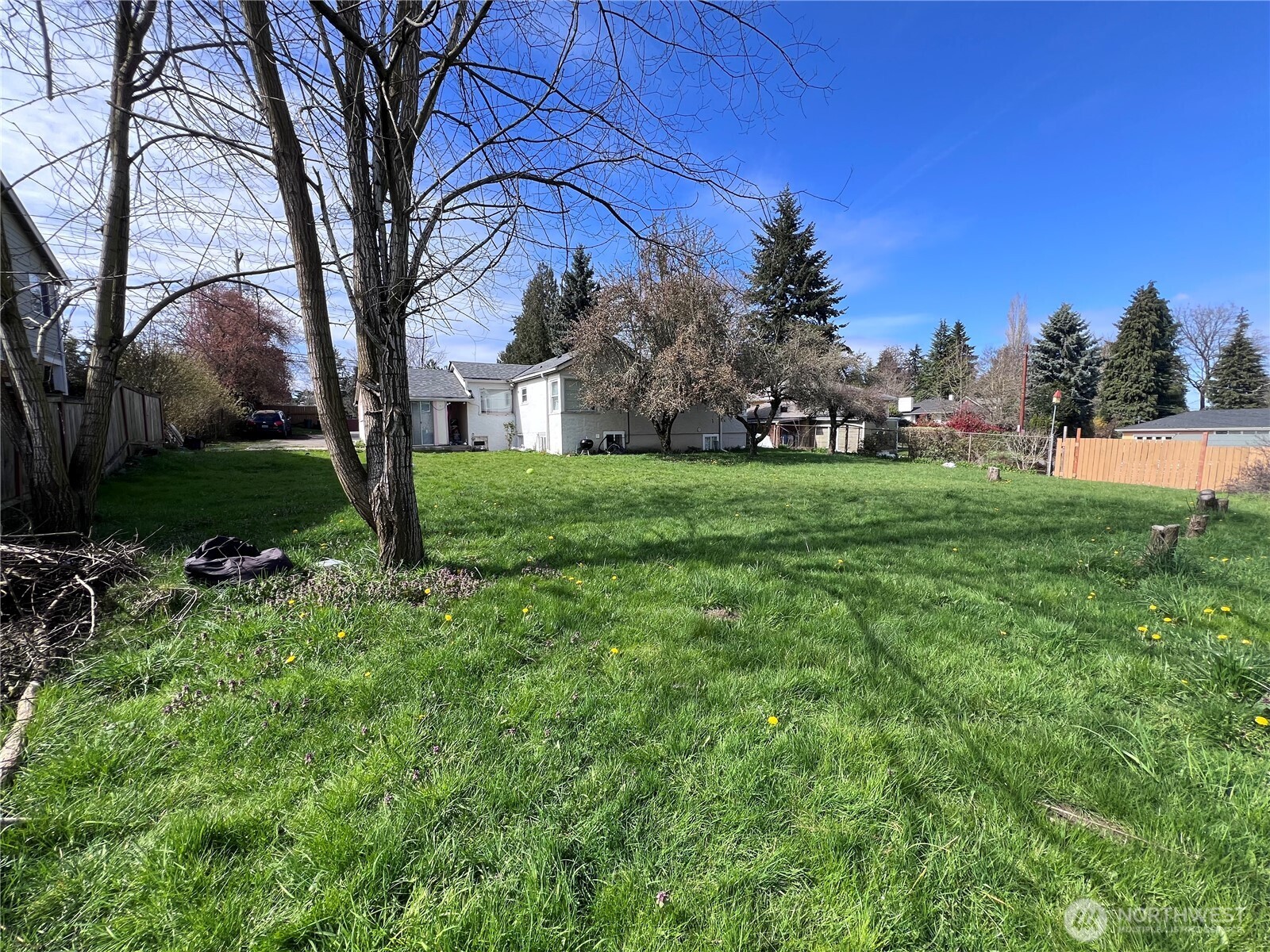 13404 Military Road South Tukwila, WA 98168 - Photo 4 of 10 a view of a house with a yard