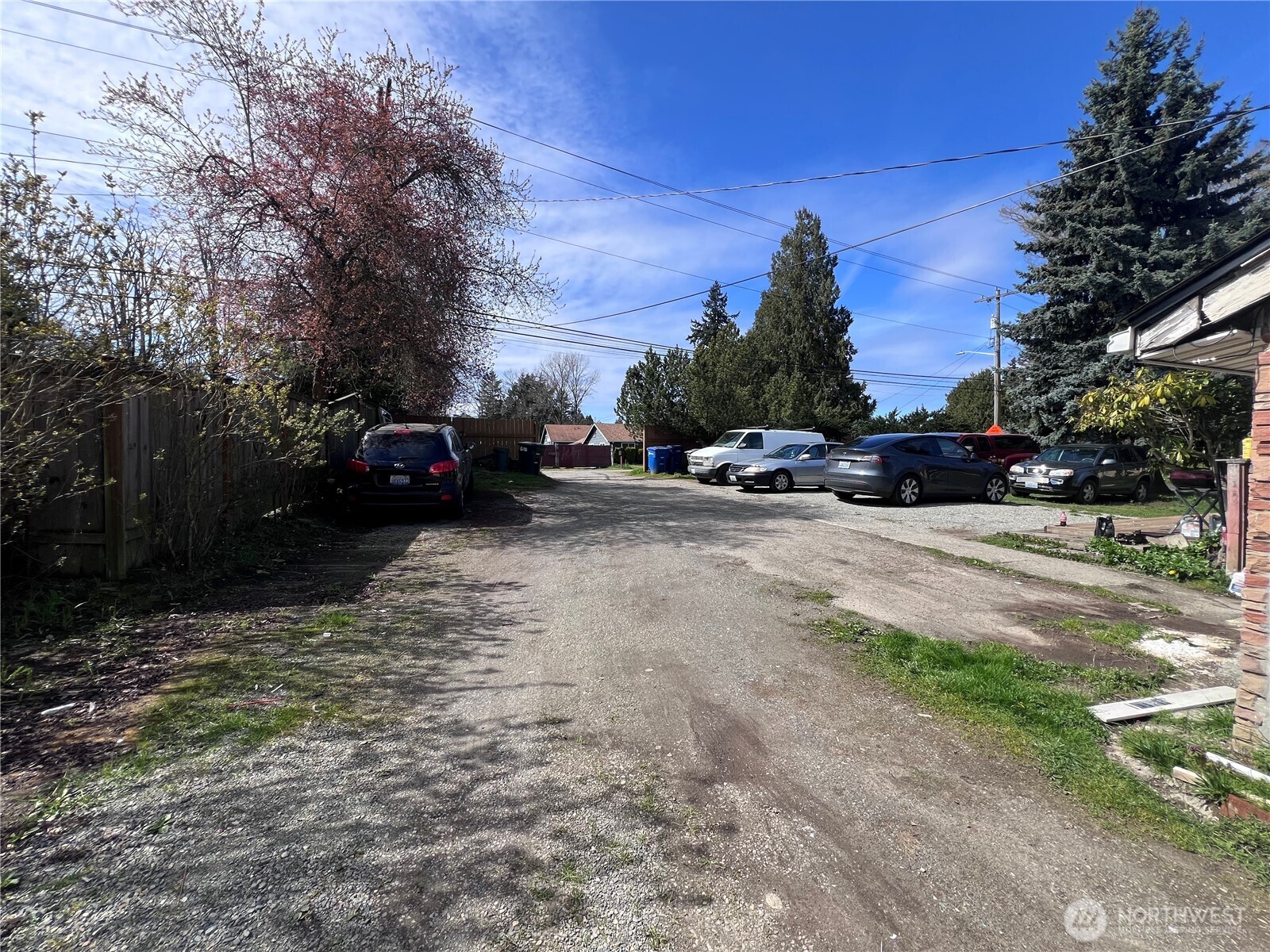 13404 Military Road South Tukwila, WA 98168 - Photo 6 of 10 a view of road with card parked on side and road