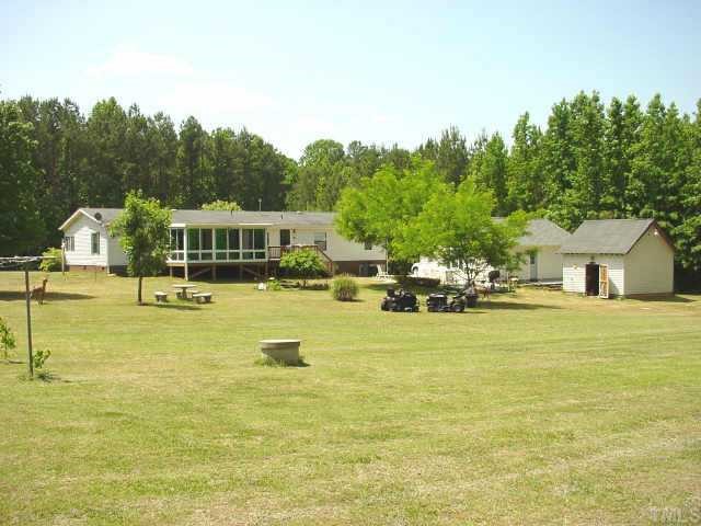 233 Hawks Road Norlina, NC 27563 - Photo 1 of 10 Huge Backyard w/ extra storage bldgs, wired workshop and garden area. Enjoy privacy and plenty of space!