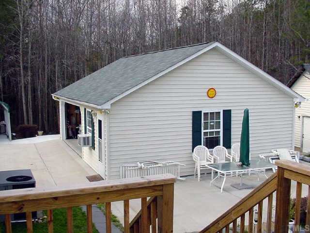 233 Hawks Road Norlina, NC 27563 - Photo 2 of 10 HUGE 2 car garage, plenty big to park two cars very comfortably. Fully wired and a seperate workshop also wired behind it!