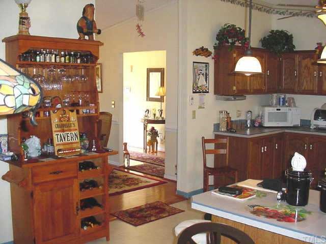 233 Hawks Road Norlina, NC 27563 - Photo 6 of 10 Looking from the breakfast/kit area toward the foyer thru the DR.