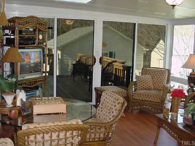 233 Hawks Road Norlina, NC 27563 - Photo 8 of 10 Beautiful Sunroom with thermal sliding windows & doors to relax in!