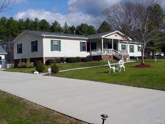233 Hawks Road Norlina, NC 27563 - Photo 10 of 10 Beautiful MODULAR HOME, from front view with nice covered porch, concrete driveway, patios and walkways!! Wonderful landscaping with plenty of space!!!