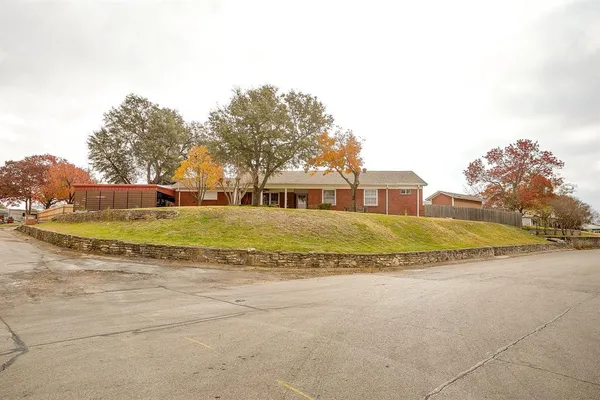 a view of a house with a big yard