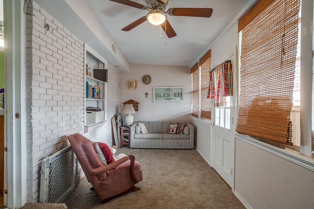 205 West Ridge Street Weatherford, TX 76086 - Photo 28 of 34 a living room with furniture and a large window