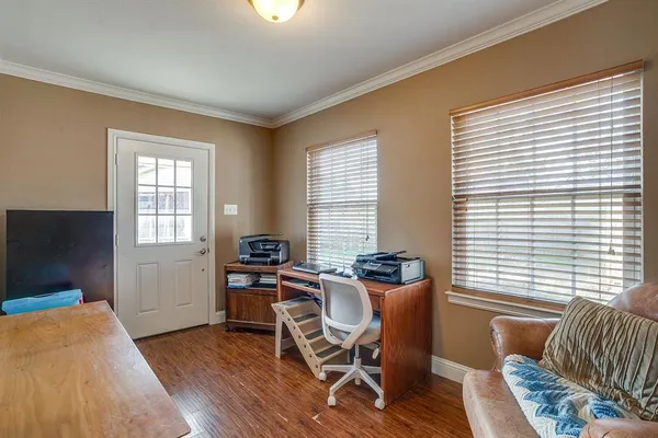 a workspace with furniture and a window