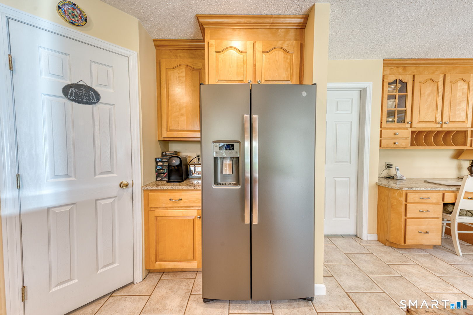 20 Renn Lane Berlin, CT 06037 - Photo 21 of 40 Pantry closet to the left of the refrigerator.