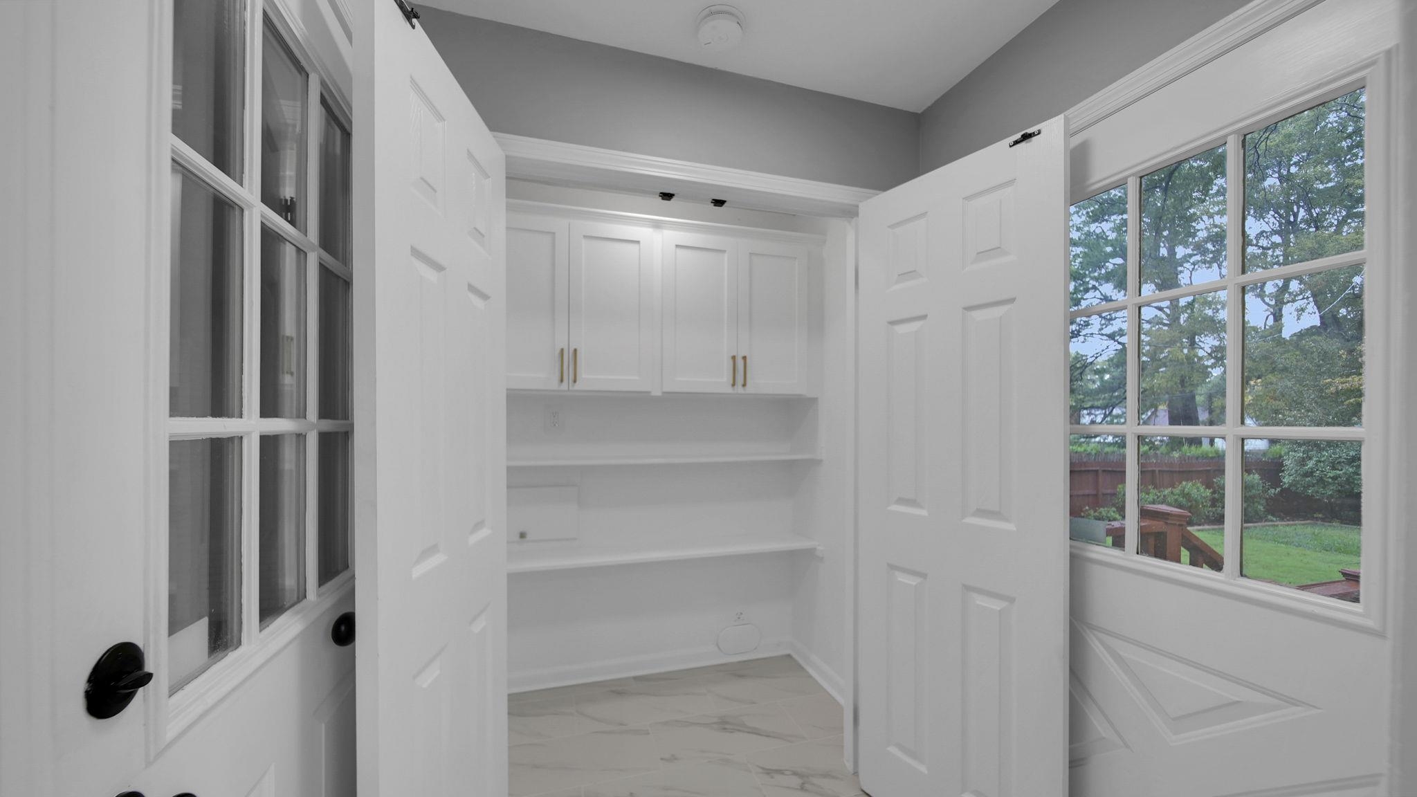 5256 Collingwood Road Memphis, TN 38117 - Photo 20 of 40 a view of walk in closet with empty racks