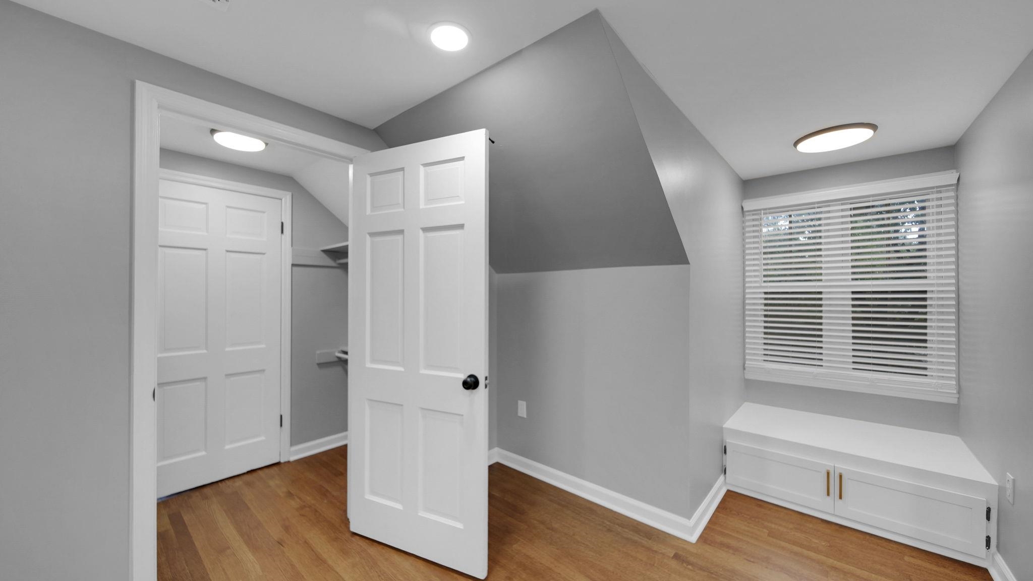 5256 Collingwood Road Memphis, TN 38117 - Photo 36 of 40 a view of empty room with wooden floor and fan