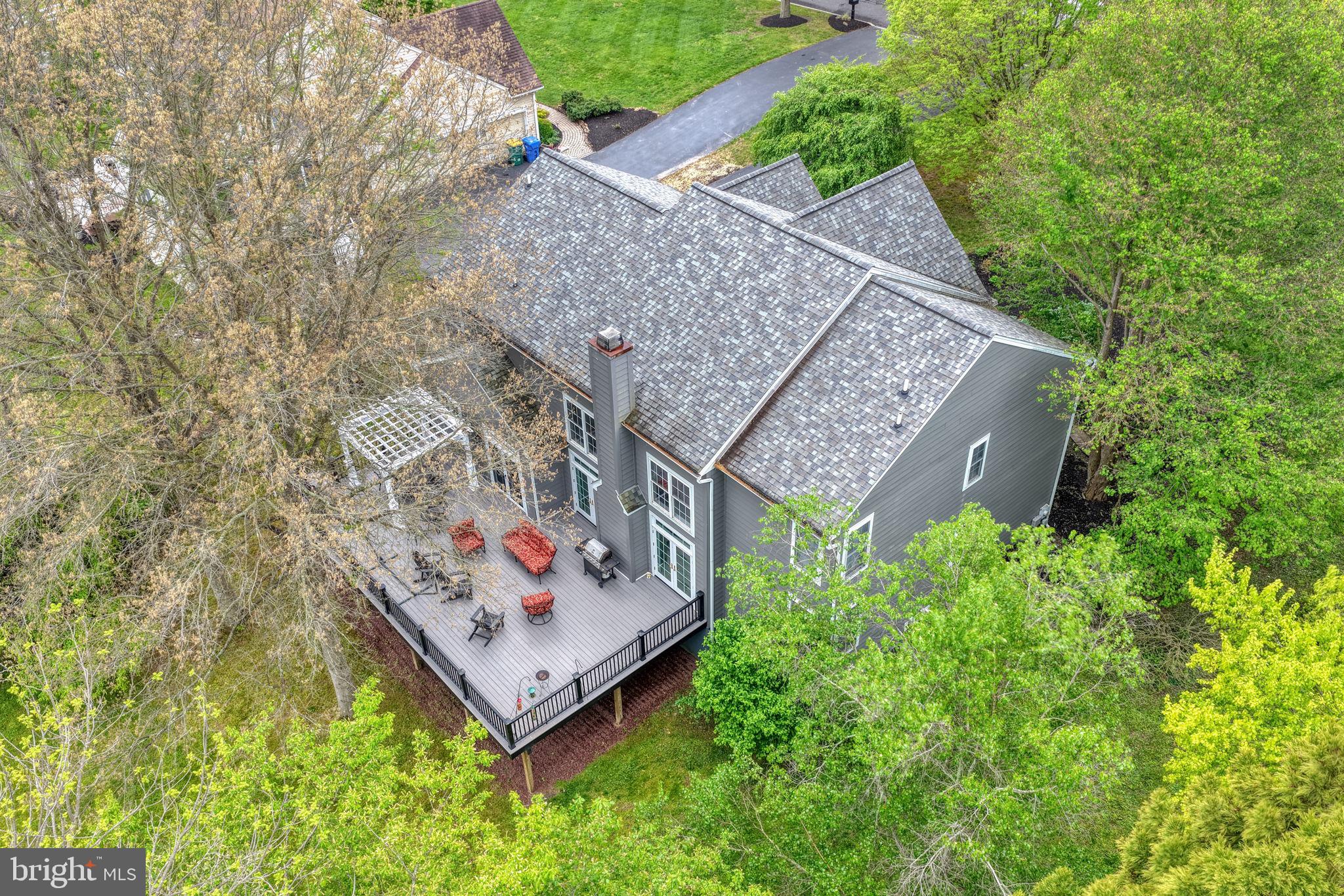 357 Willits Way Garnet Valley, PA 19060 - Photo 56 of 63 an aerial view of a house with garden space and a patio