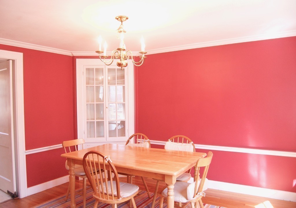 29 Pierrepont Road Newton, MA 02462 - Photo 8 of 20 a view of a dining room with furniture and a chandelier