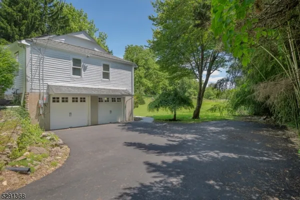 a view of a house with a street