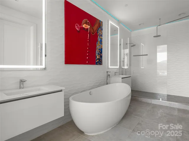 a bathroom with a bathtub and a sink