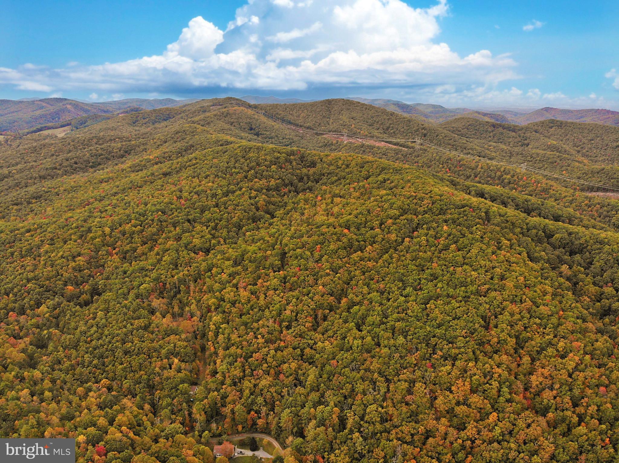 0 Higgs Road Northeast Willis, VA 24380 - Photo 2 of 29 a view of a mountain range in a cloudy sky