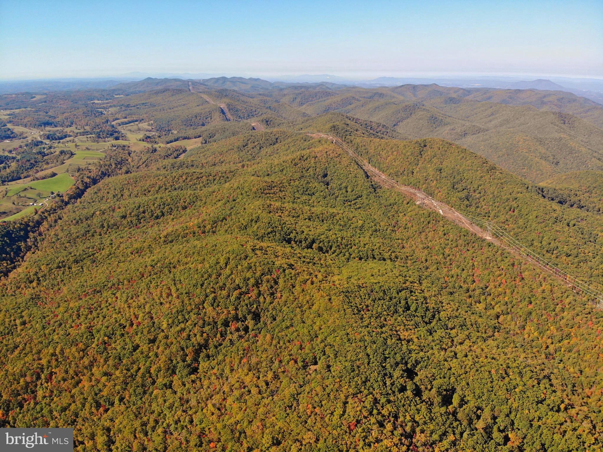 0 Higgs Road Northeast Willis, VA 24380 - Photo 8 of 29 a view of a city with mountains in the background