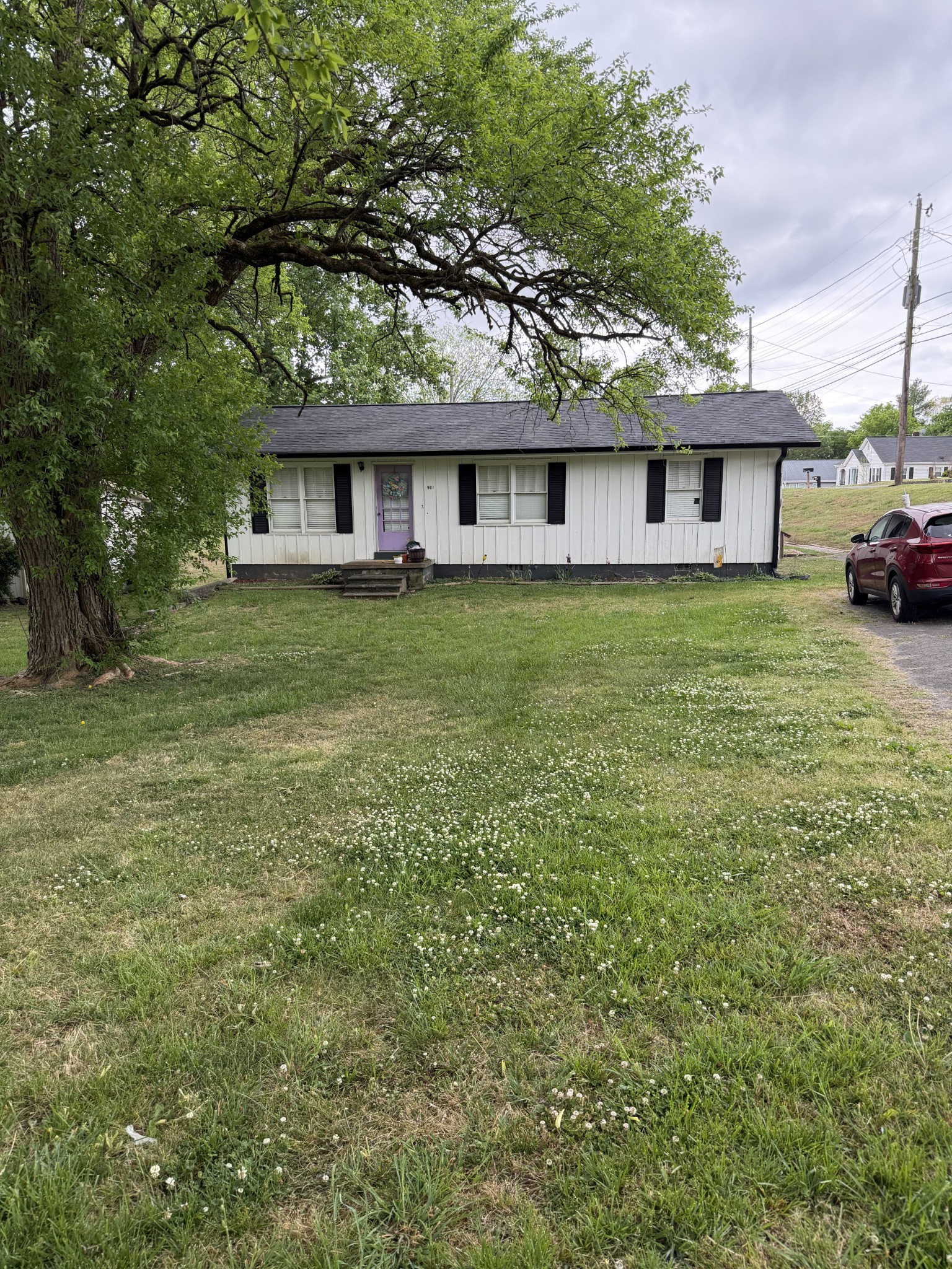 901 East College Street Pulaski, TN 38478 - Photo 1 of 20 a view of a house with a yard
