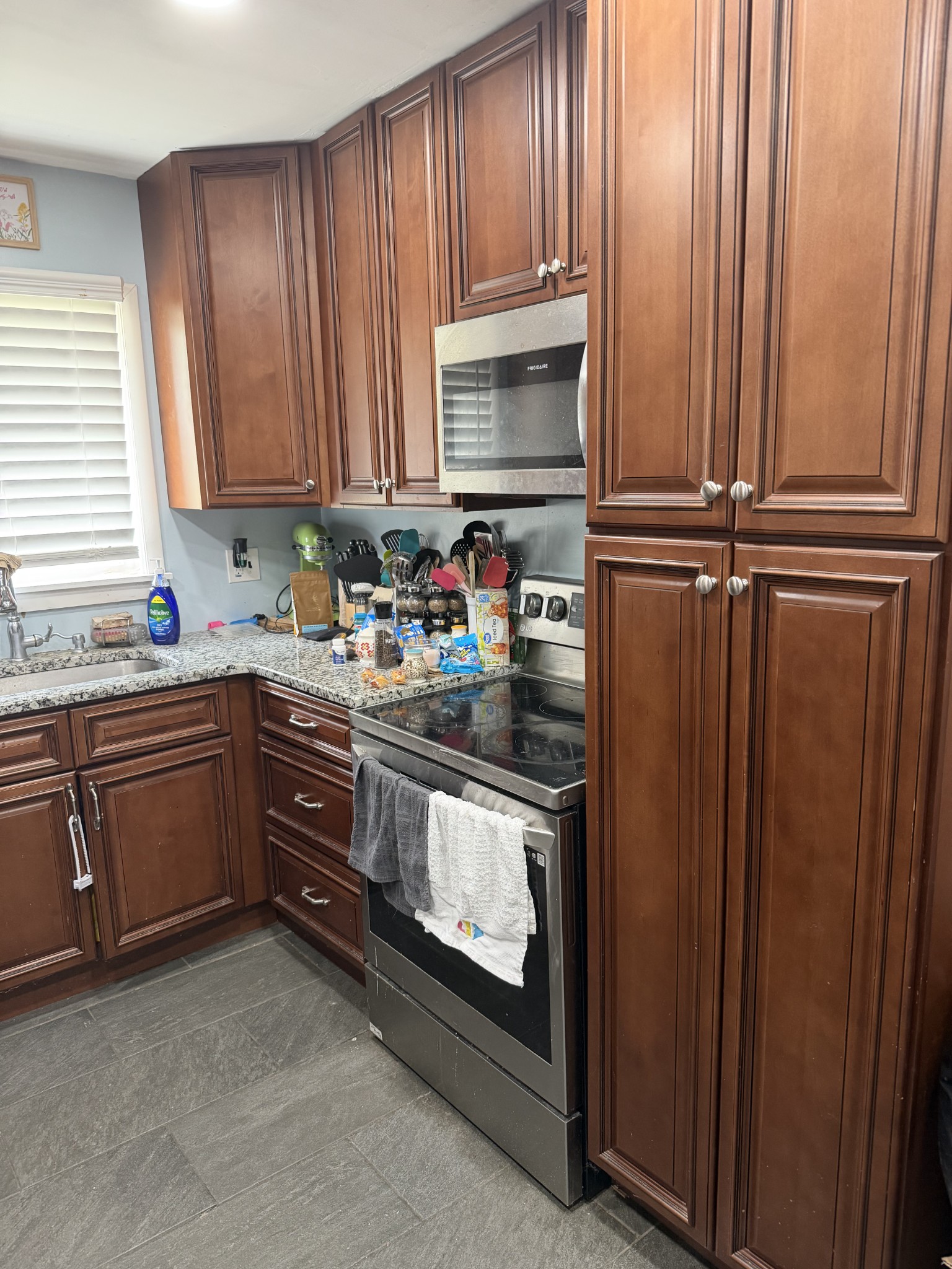 901 East College Street Pulaski, TN 38478 - Photo 11 of 20 a kitchen with stainless steel appliances a refrigerator and sink