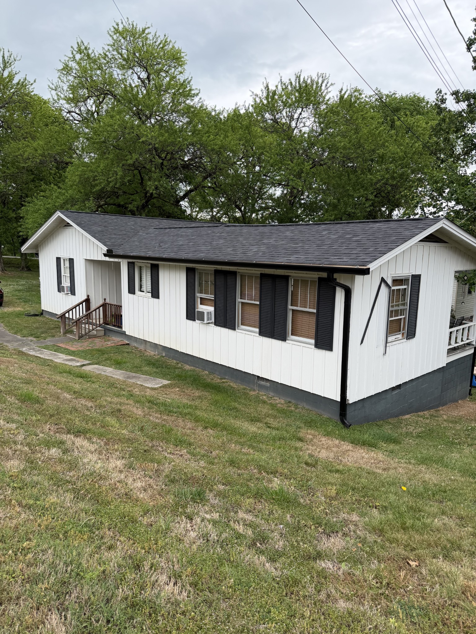 901 East College Street Pulaski, TN 38478 - Photo 2 of 20 a front view of a house with a garden