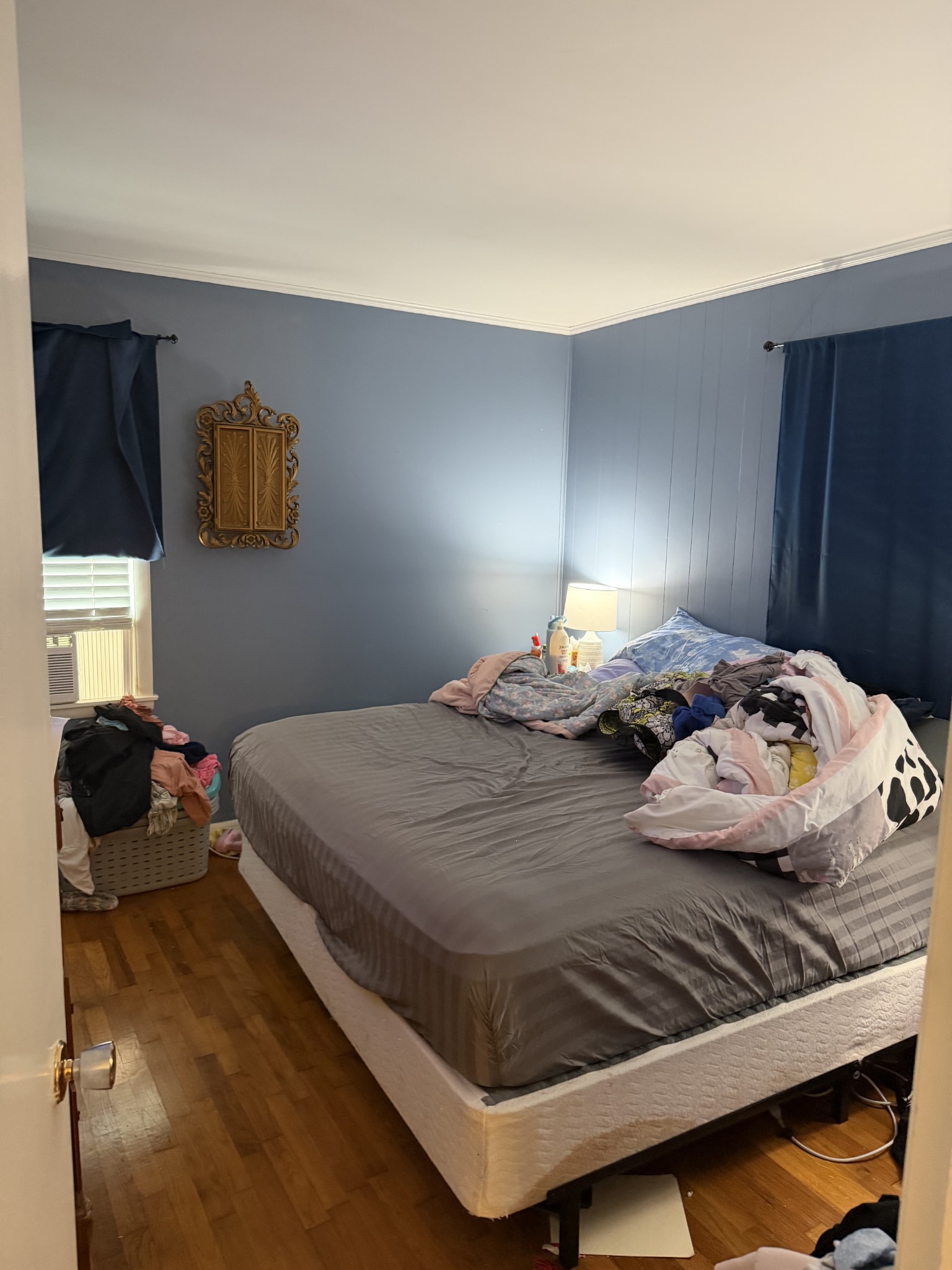 901 East College Street Pulaski, TN 38478 - Photo 9 of 20 a bedroom with a bed and a window