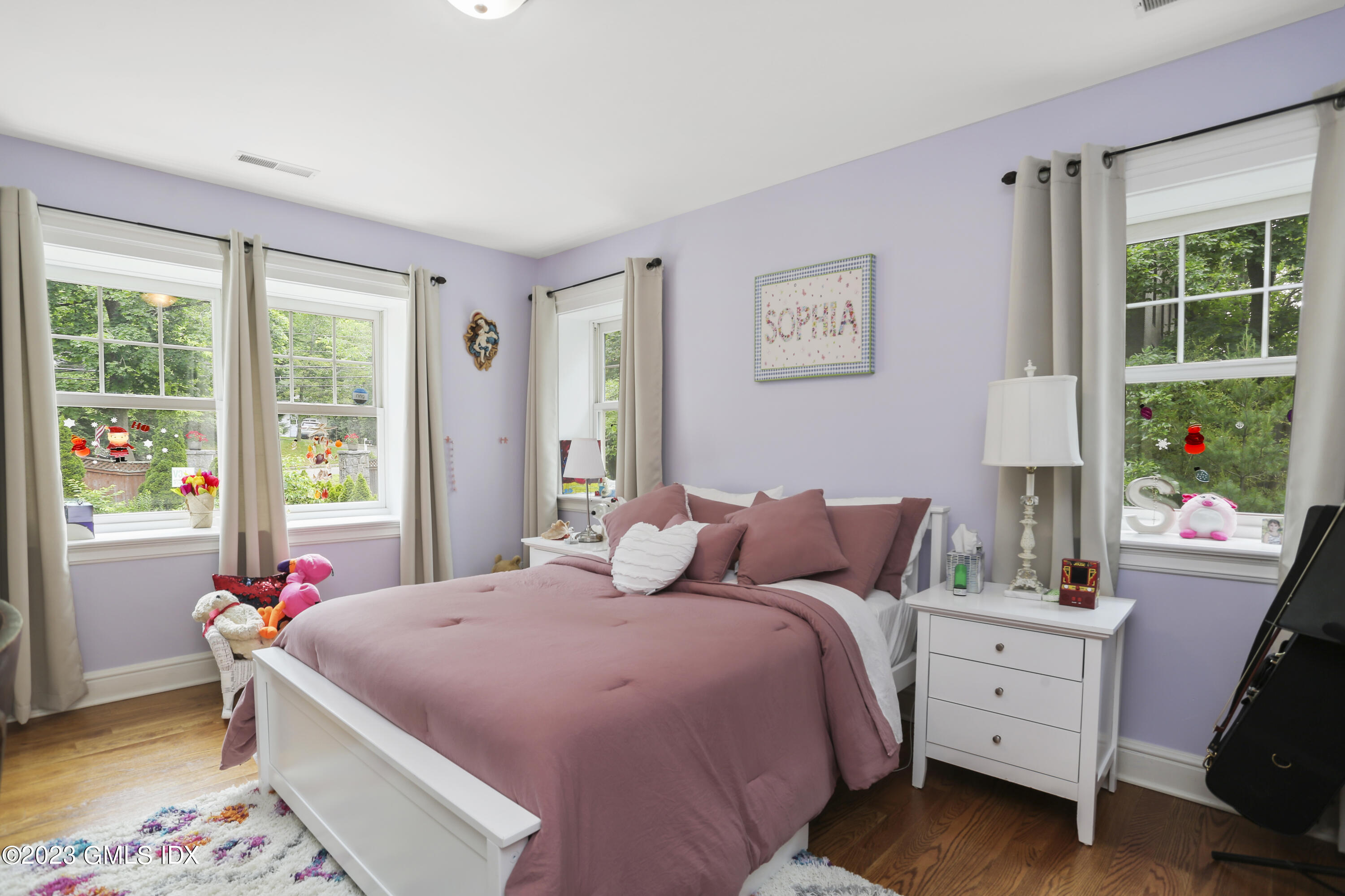 80 Brookside Drive Greenwich, CT 06831 - Photo 14 of 29 a bedroom with a bed and a window