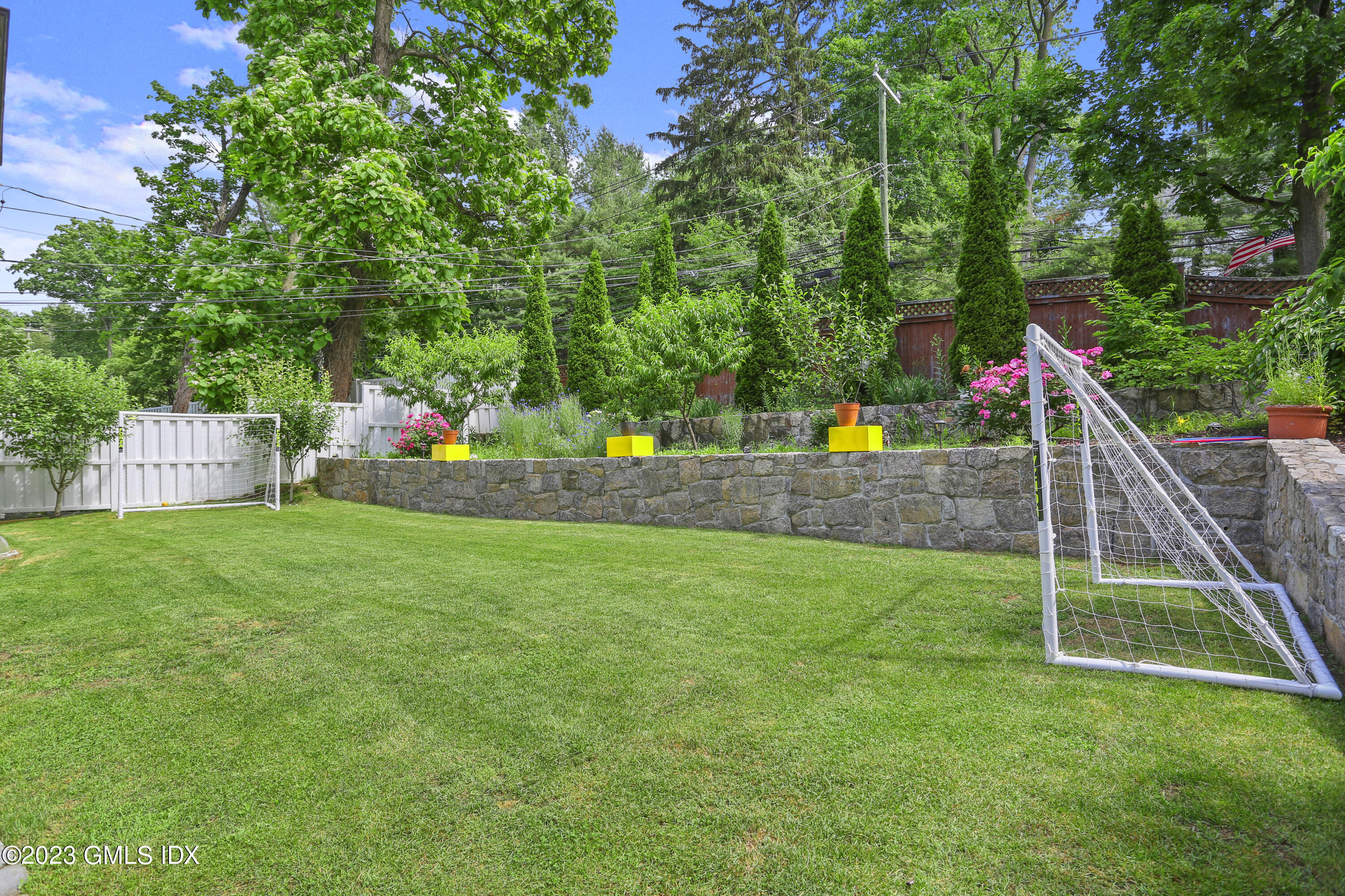 80 Brookside Drive Greenwich, CT 06831 - Photo 22 of 29 a view of a house with a park