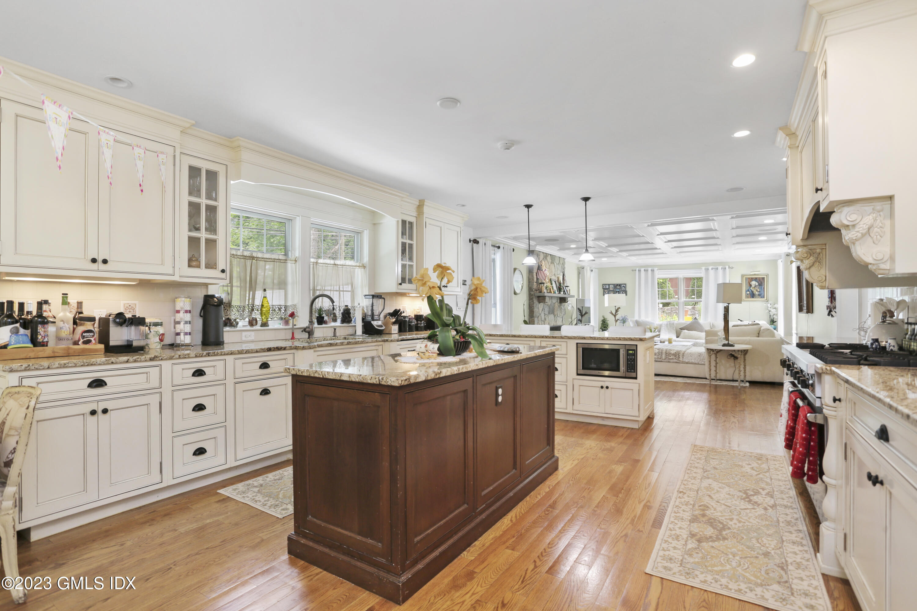 80 Brookside Drive Greenwich, CT 06831 - Photo 3 of 29 a kitchen with lots of counter top space and wooden floor