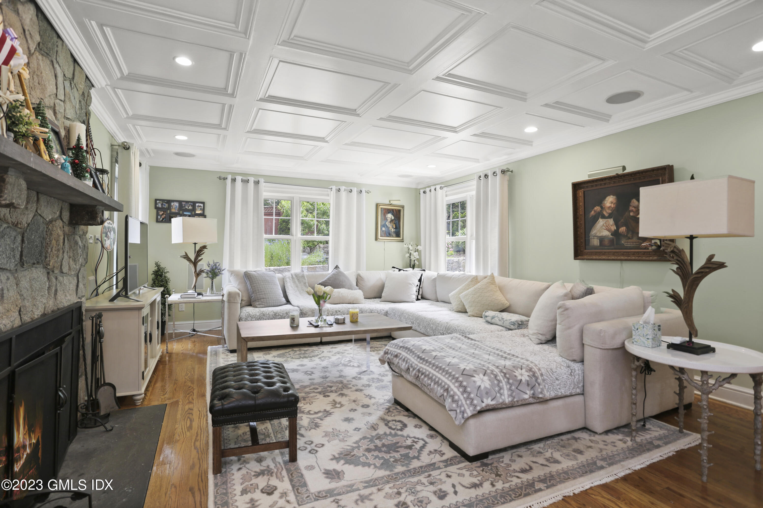 80 Brookside Drive Greenwich, CT 06831 - Photo 6 of 29 a living room with furniture a rug and a chandelier