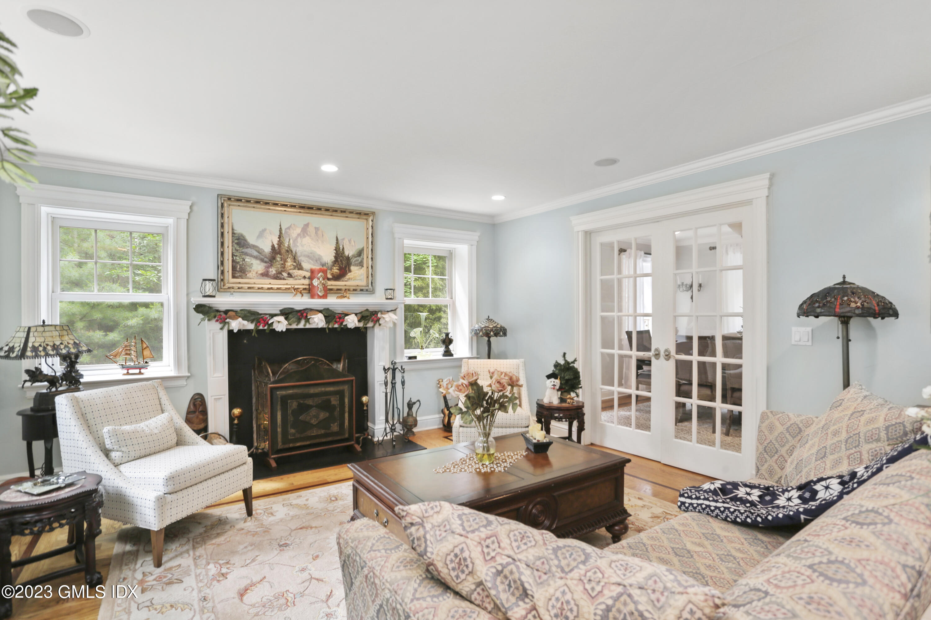 80 Brookside Drive Greenwich, CT 06831 - Photo 9 of 29 a living room with furniture and a fireplace