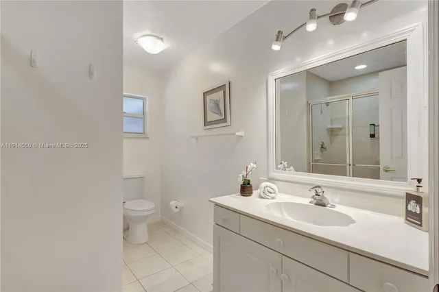 a bathroom with a bathtub and a sink