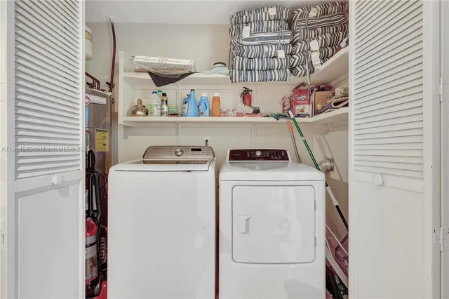 a view of a porch with a table and chairs and potted plants