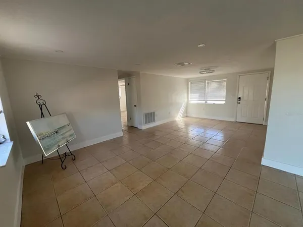 a view of livingroom with furniture and lounge chair