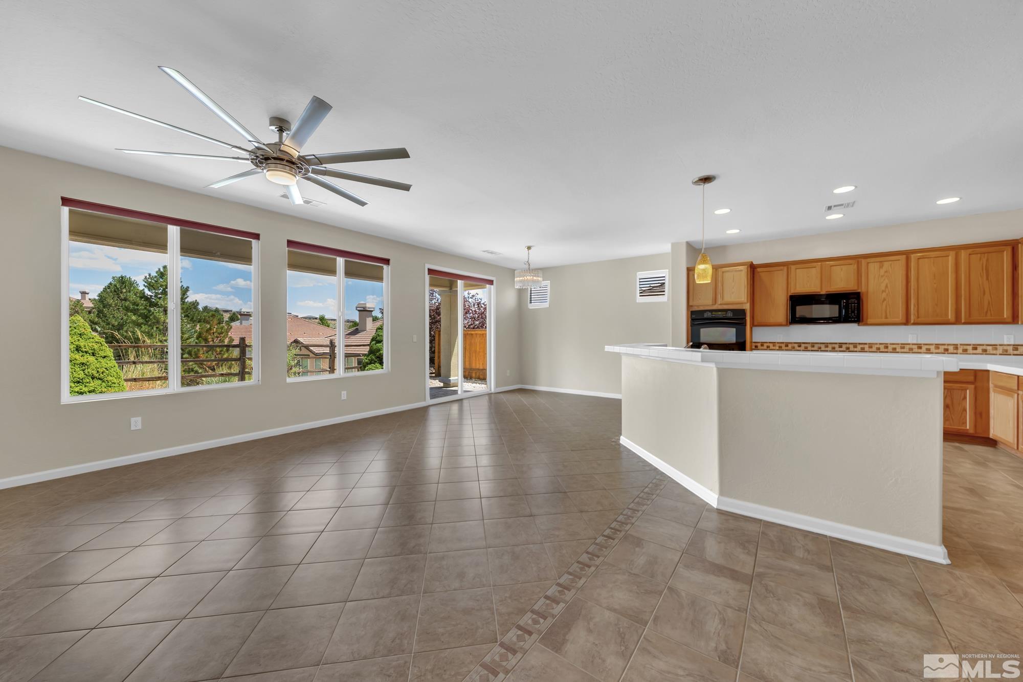1530 Meridian Ranch Drive Reno, NV 89523 - Photo 3 of 25 a view of a kitchen with a sink and a window